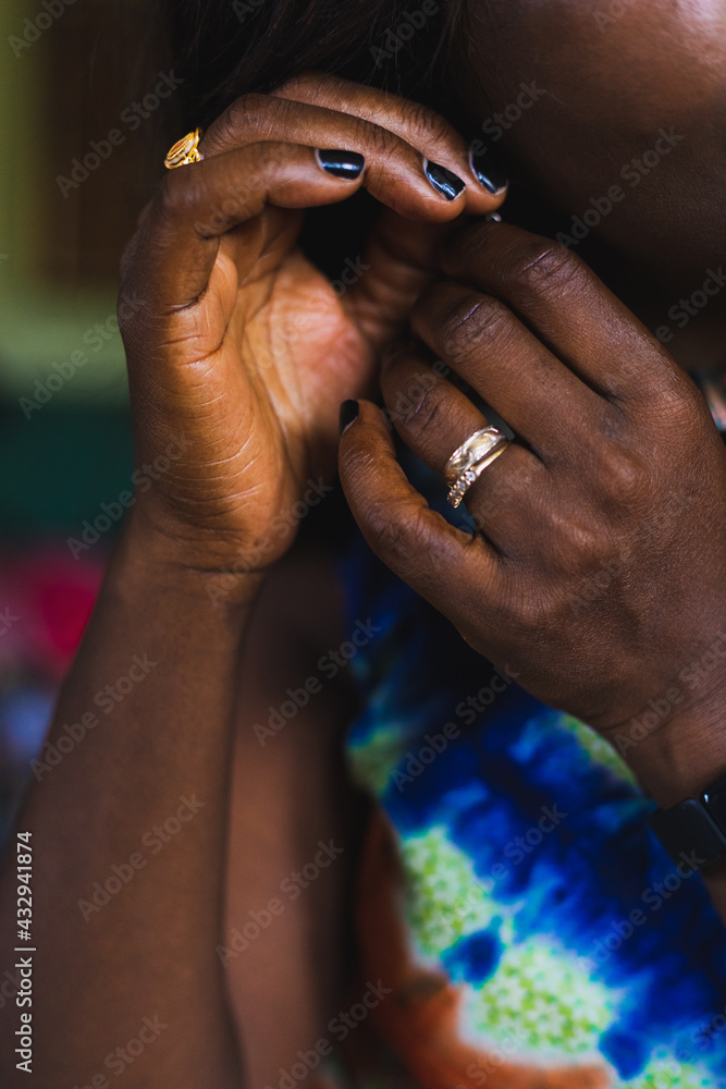 close up of a person holding hands