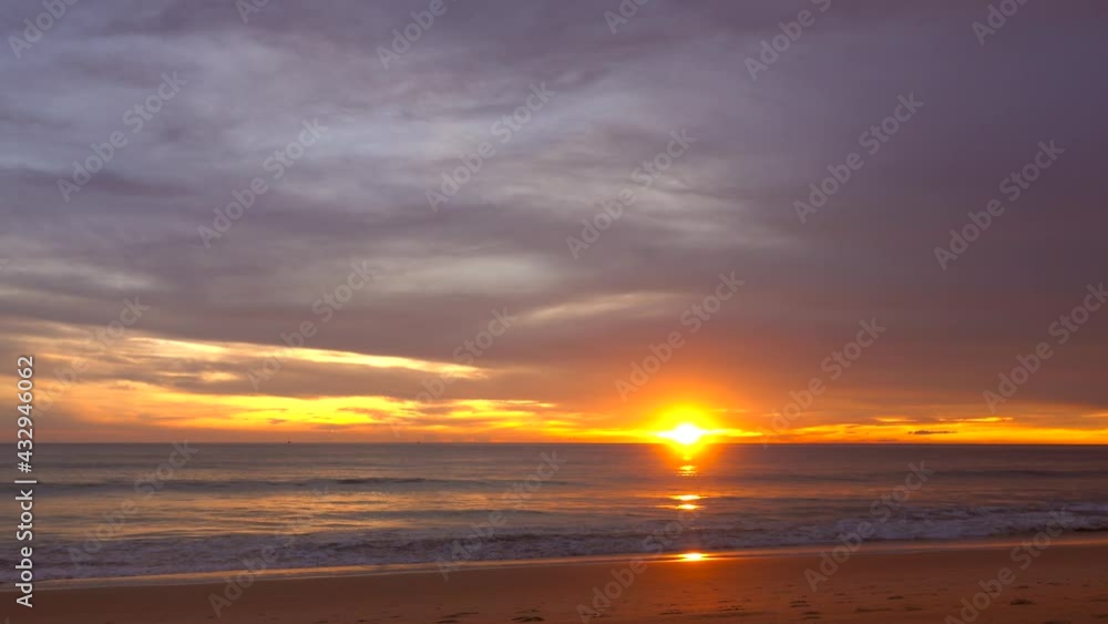 Professional 4K Video. Scene of Sunset on tropical beach sea. New normal after covid-19. Phuket Thailand beautiful tropical beach with a sunset sky. Beautiful Phuket beach in Andaman sea sunset. Professional 4K Video. Scene of Sunset on tropical beach sea. New normal after covid-19. Phuket Thailand beautiful tropical beach with a sunset sky. Beautiful Phuket beach in Andaman sea sunset.