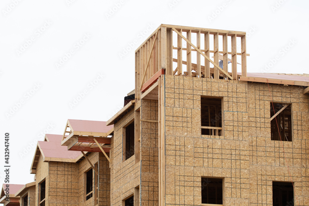 walls and rafters of a plywood house frame walls and rafters of a plywood house frame