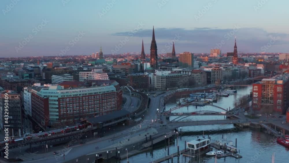 Aerial dolly in view of Hamburg city center with famous landmarks and historical buildings during the sunset Aerial dolly in view of Hamburg city center with famous landmarks and historical buildings during the sunset
