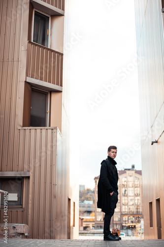 man standing in front of building © Майя Зерко