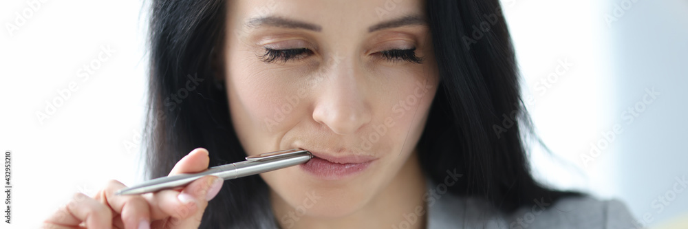 Woman with sly eyes looks at diary Woman with sly eyes looks at diary