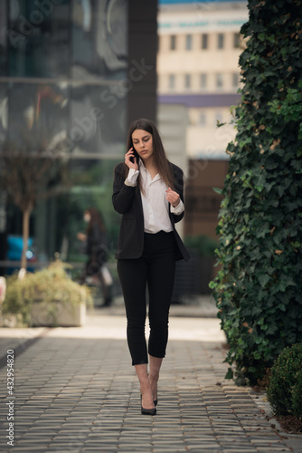 Businesswoman is talking on the phone