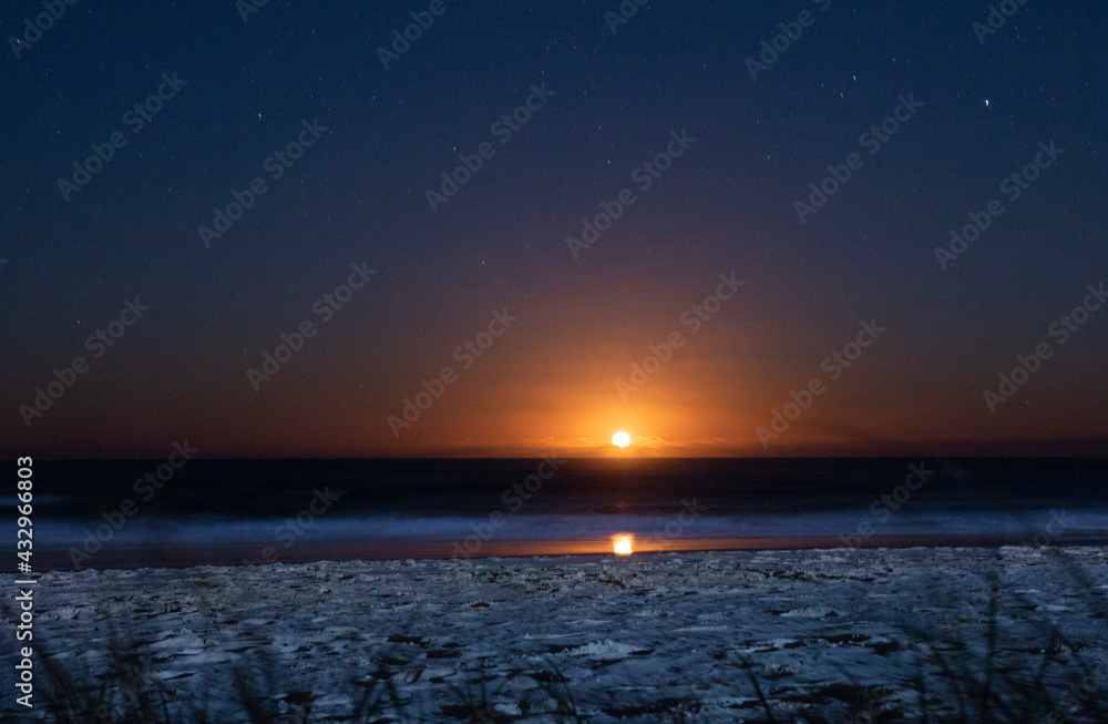 Golden Moon Rises Over Gold Coast Beach and Ocean
