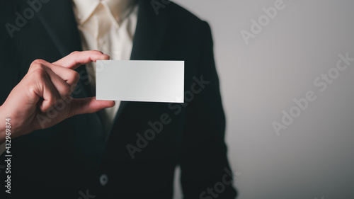  businessman with a piece of paper in his hand