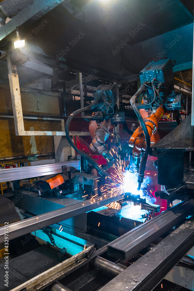 Welding robot, the process of welding a metal profile. Welding robot, the process of welding a metal profile.