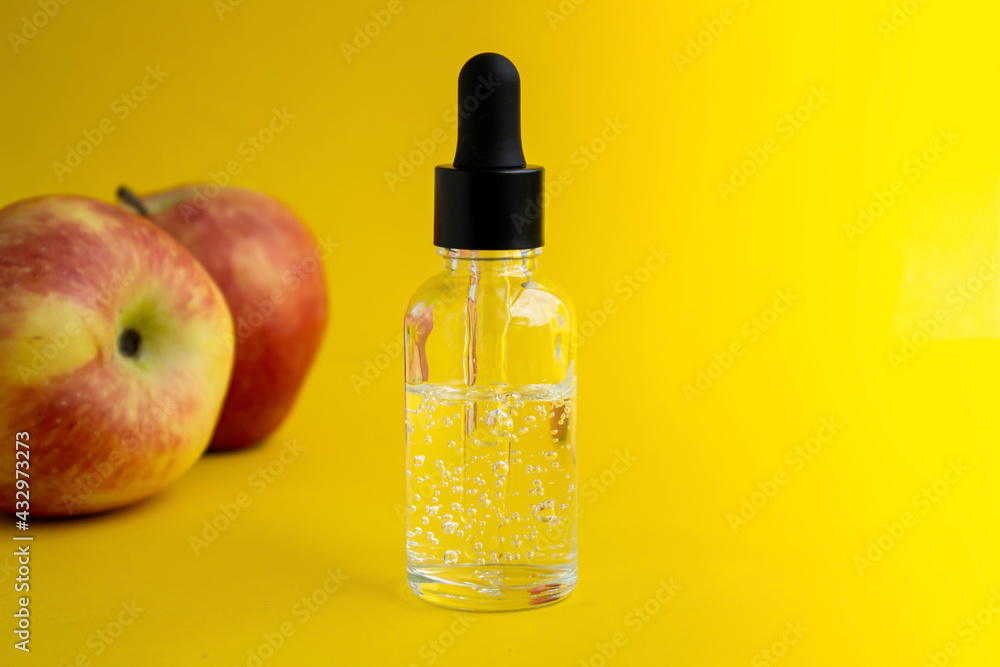 Apple-scented oil. Cosmetic serum with apple extract. Apple-scented oil. Cosmetic serum with apple extract.
