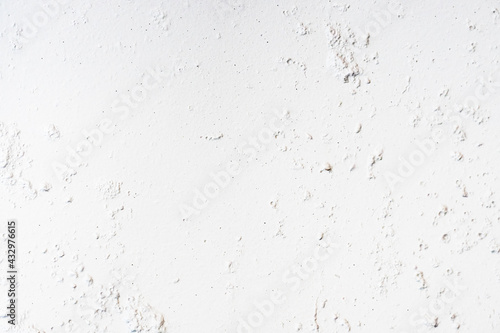 The texture or background of a white concrete plaster wall.