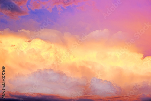 Heaven background.Sky.Multicolored clouds. Summer weather. Clouds of blue, lilac, yellow and pink colors. Heaven at Sunset.Colorful summer sunset sky.Summer time