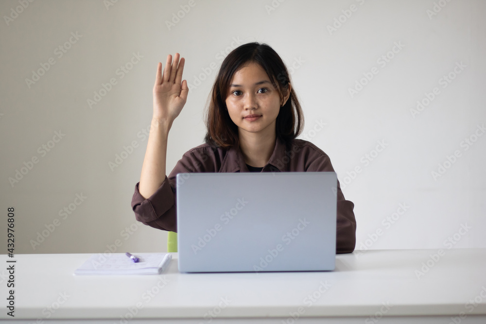 Portrait of beautiful young woman working in the office. Portrait of beautiful young woman working in the office.