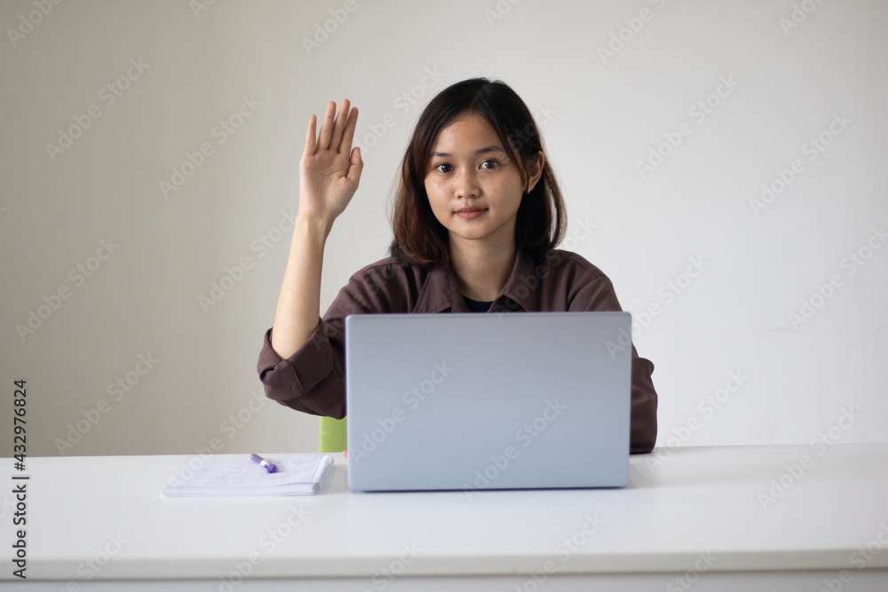Portrait of beautiful young woman working in the office. Portrait of beautiful young woman working in the office.