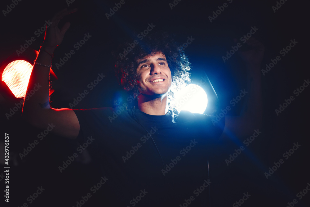 Closeup portrait of confident DJ with headphones Closeup portrait of confident DJ with headphones