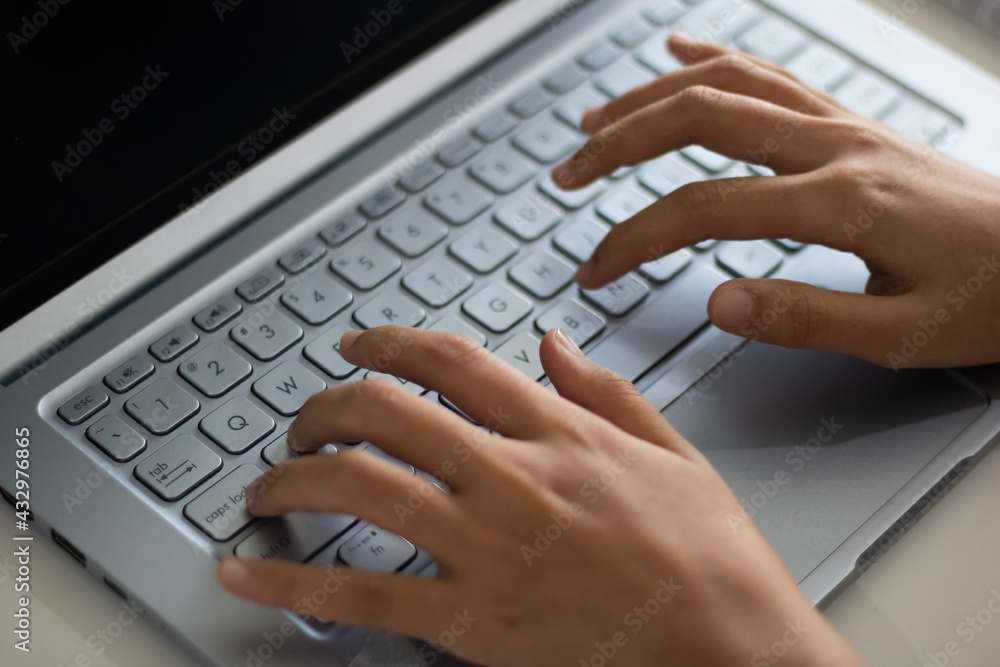 Hands of an office woman typing Hands of an office woman typing