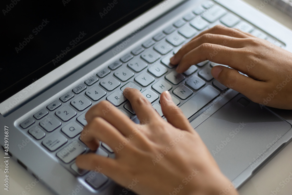 Hands of an office woman typing Hands of an office woman typing
