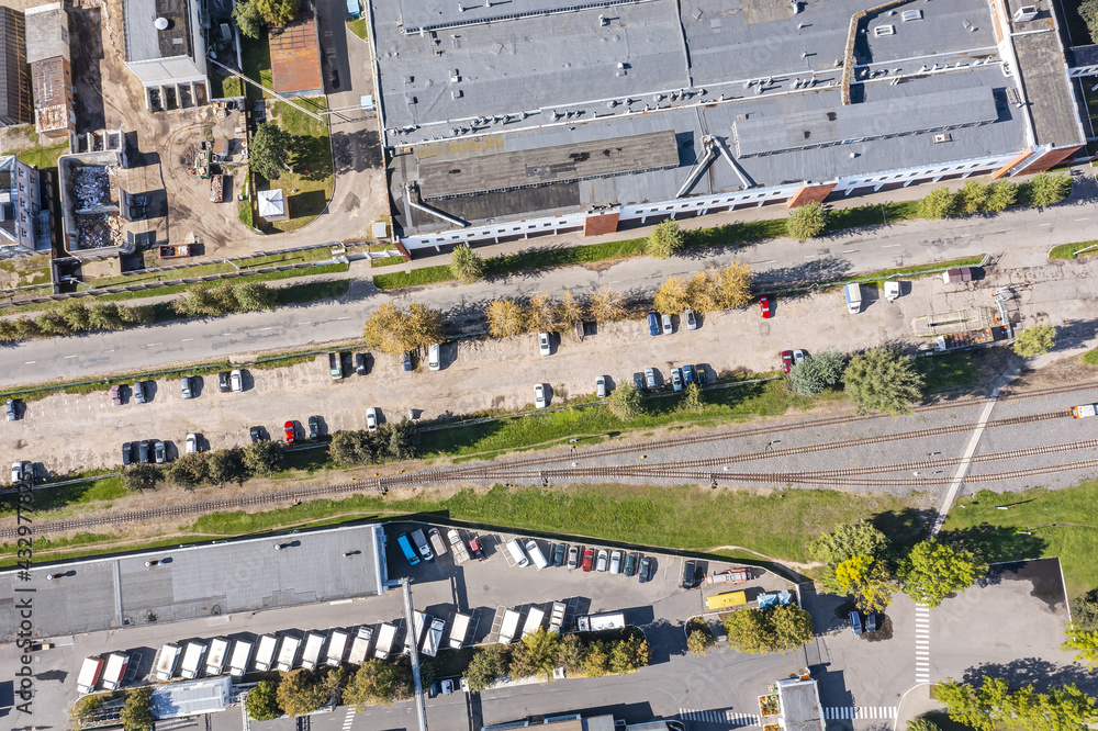 parking lot for vehicles at industrial district. aerial photography with drone
