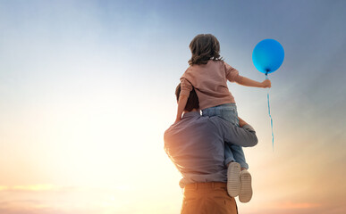 Father and his daughter outdoors