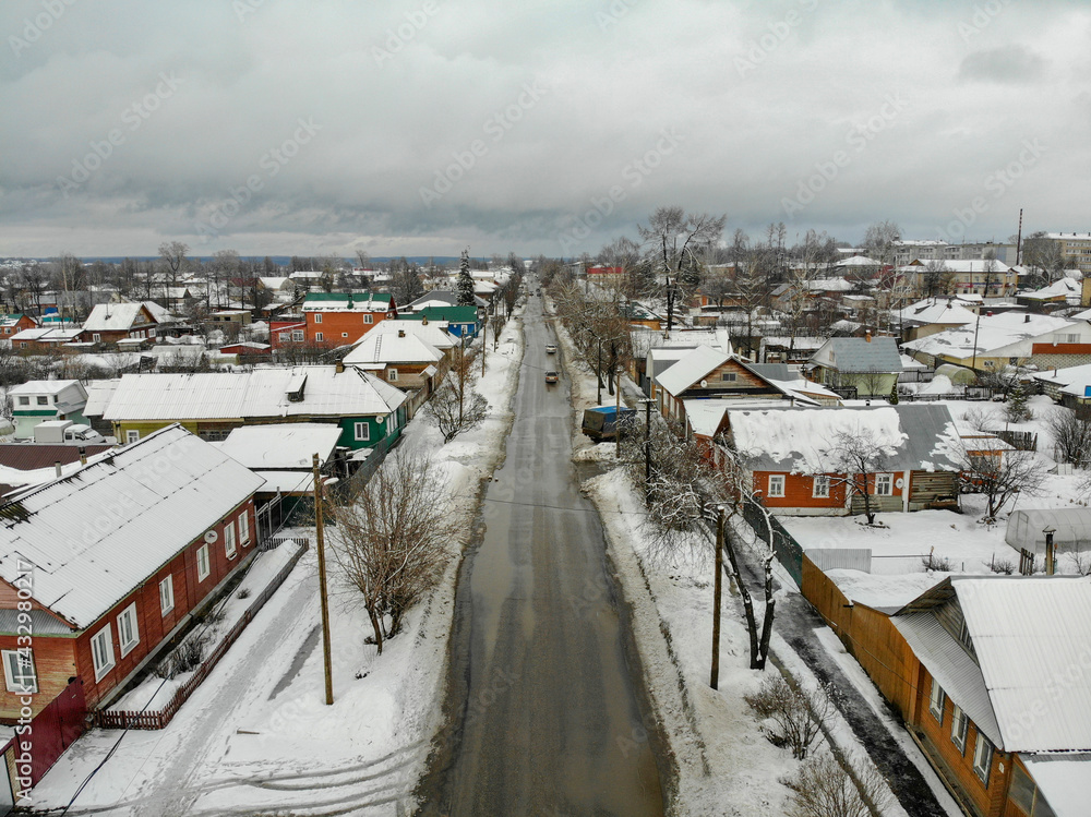 Obraz premium Aerial view of Kirov street in Sovetsk city in winter (Kirov region, Russia)