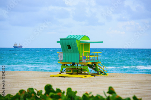 Miami South Beach lifeguard tower and coastline with cloud and blue sky. © Volodymyr