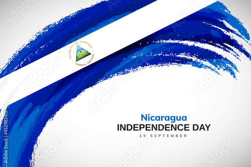 Fotografia Happy independence day of Nicaragua with watercolor brush stroke flag background