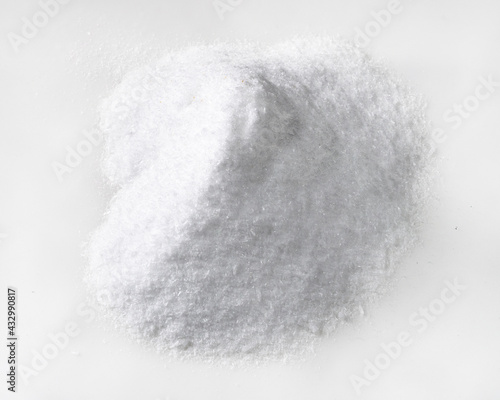 handful of dextrose crystalline sugar on white
