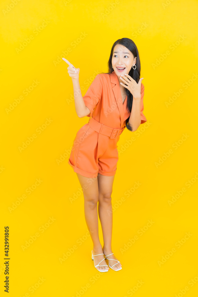 Portrait beautiful young asian woman smile with action Portrait beautiful young asian woman smile with action