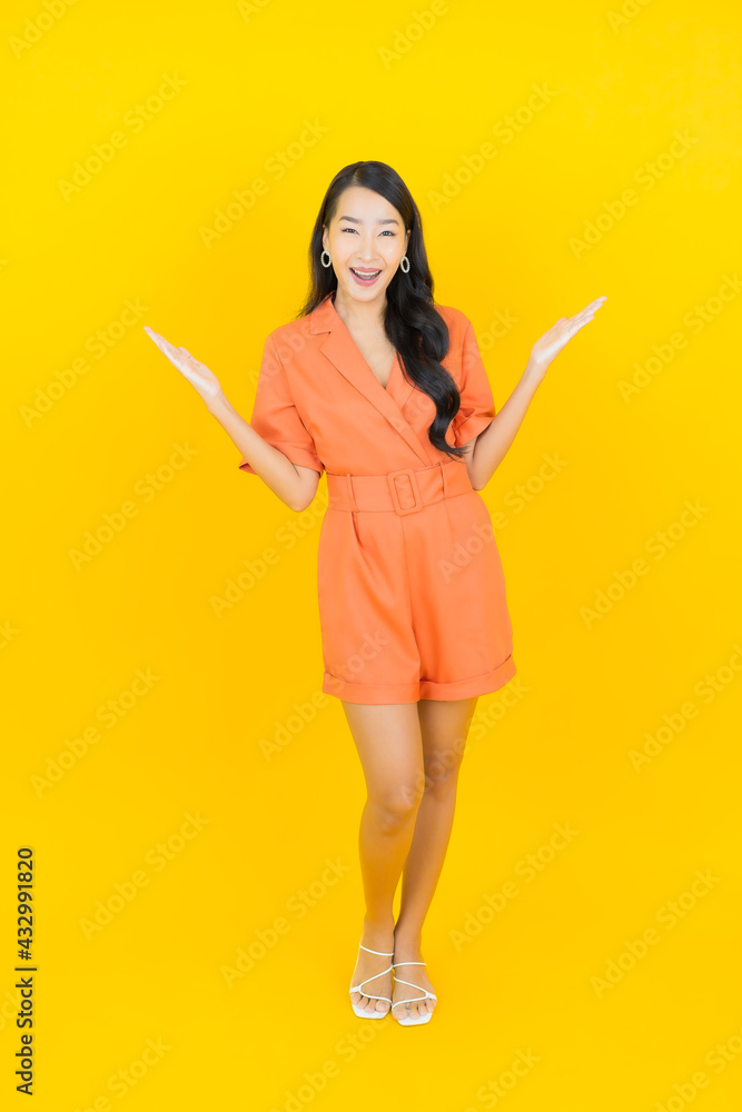 Portrait beautiful young asian woman smile with action Portrait beautiful young asian woman smile with action
