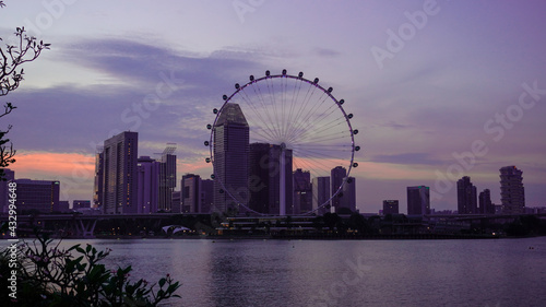Singapore Flyer view beside the marina bay at evening.