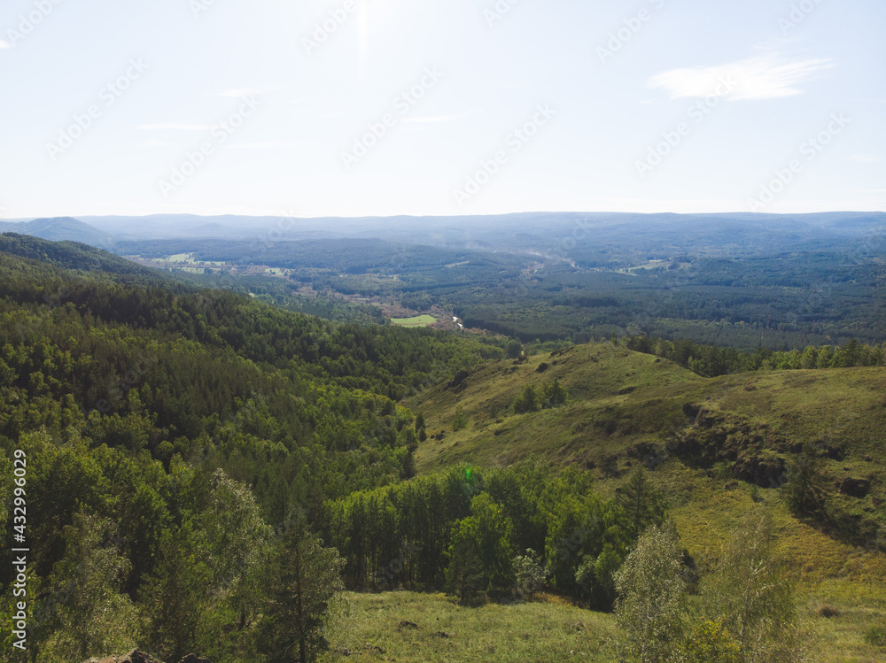 evergreen fir forest on a hilltop among the mountains of the National Park of the Republic of Bashkortostan on Lake Bannoye