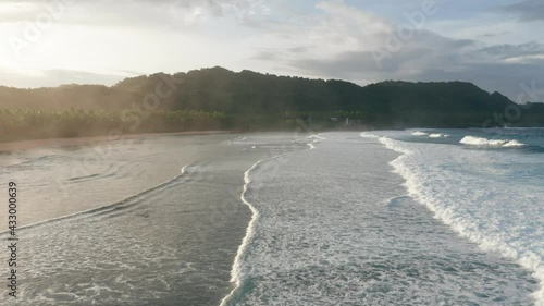 Ocean Sunset Mist Drone Landscape at Pacifico Beach Siargao Philippines 