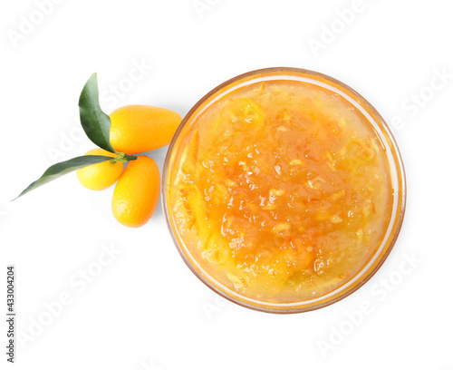 Delicious kumquat jam in bowl and fresh fruits on white background, top view