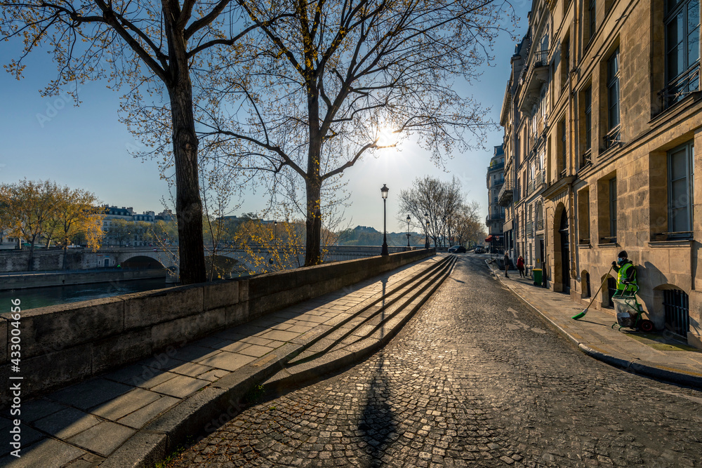 Paris, France - April 13, 2021: Typical parisian place on Ile Saint Louis in Paris Paris, France - April 13, 2021: Typical parisian place on Ile Saint Louis in Paris