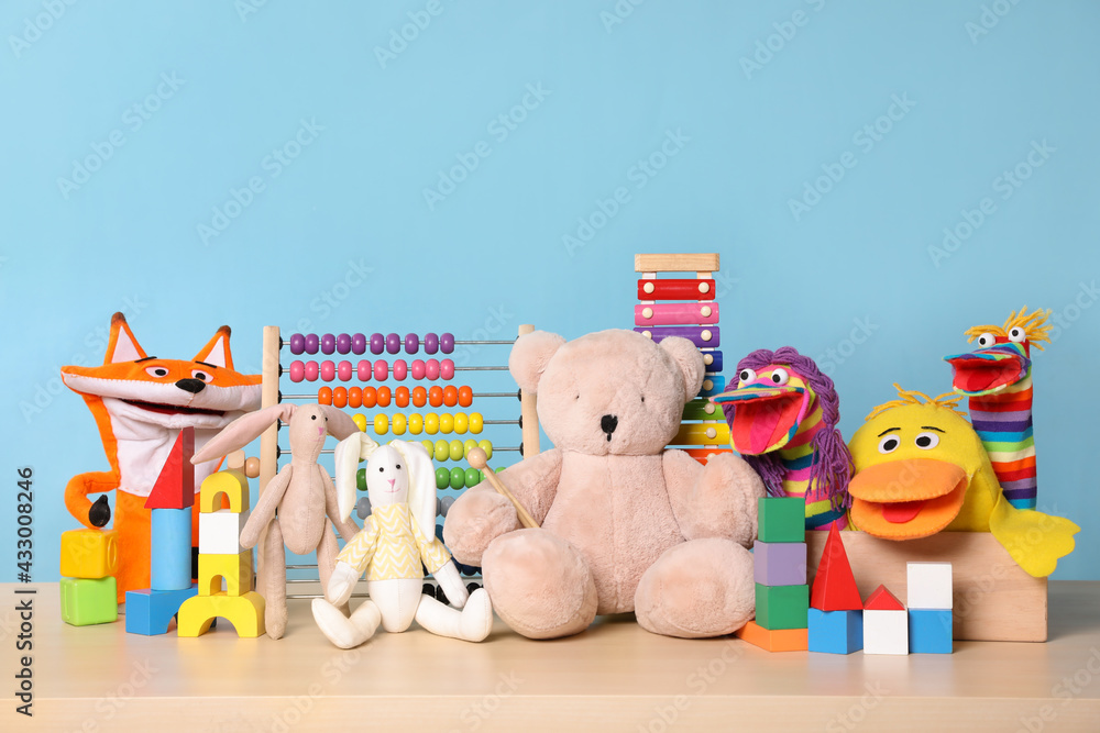 Obraz premium Collection of different toys on wooden table