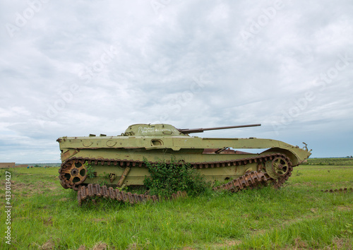 Tank wreck from the civil war in a field, Huila Province, Caconda, Angola photo