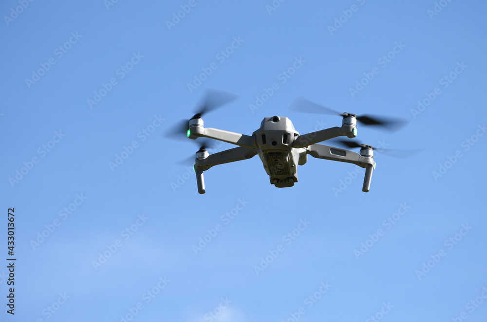 drone with integrated video camera in flight drone with integrated video camera in flight