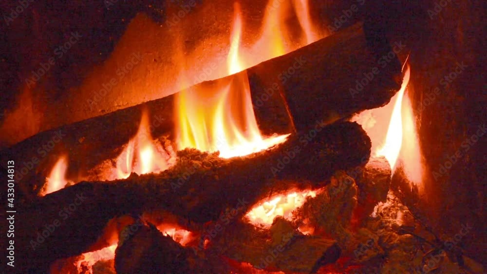Zooming in on Log fire burning Zooming in on Log fire burning