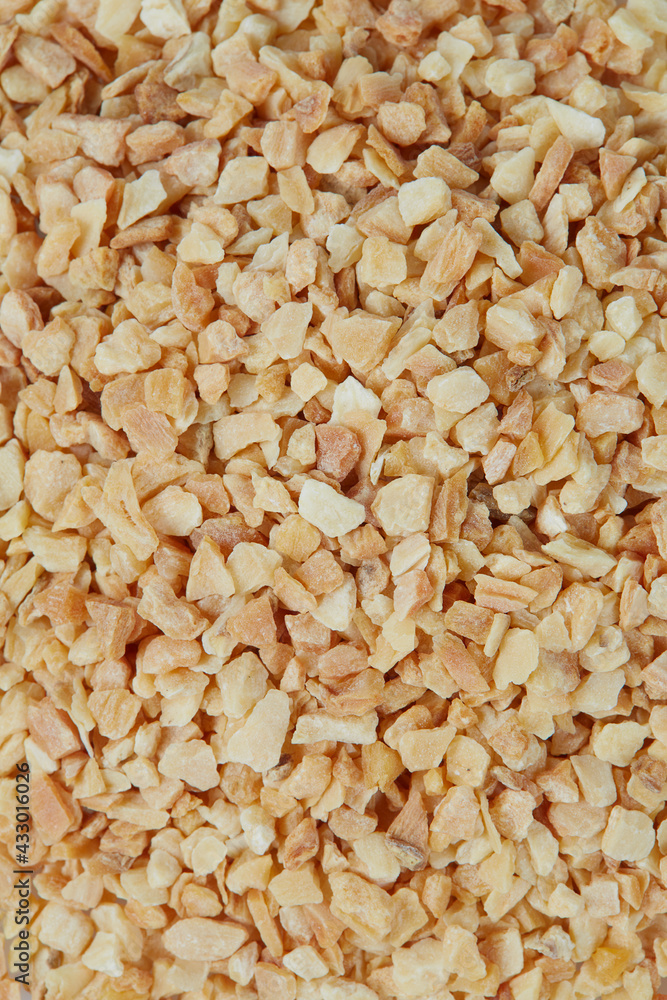 Granulated garlic isolated on white background. Granulated garlic isolated on white background.