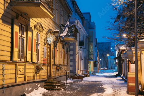 Parnu, Estonia. Night View Of Hospidali Street With Old Buildings And Houses In Evening Night Illuminations.