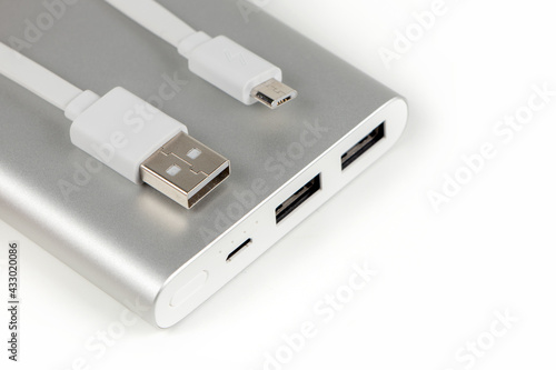 Wallpaper Mural Power bank for charging mobile devices. White smart phone charger with power bank battery bank . External battery for mobile devices. Torontodigital.ca