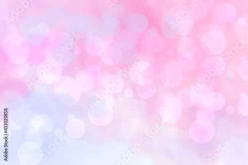Abstract blurred vivid spring summer light delicate pastel blue pink bokeh background texture with bright soft color circles and bokeh lights. Card concept. Beautiful backdrop illustration.
