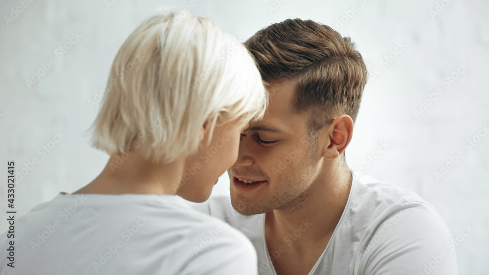 happy young man and blonde woman at home happy young man and blonde woman at home