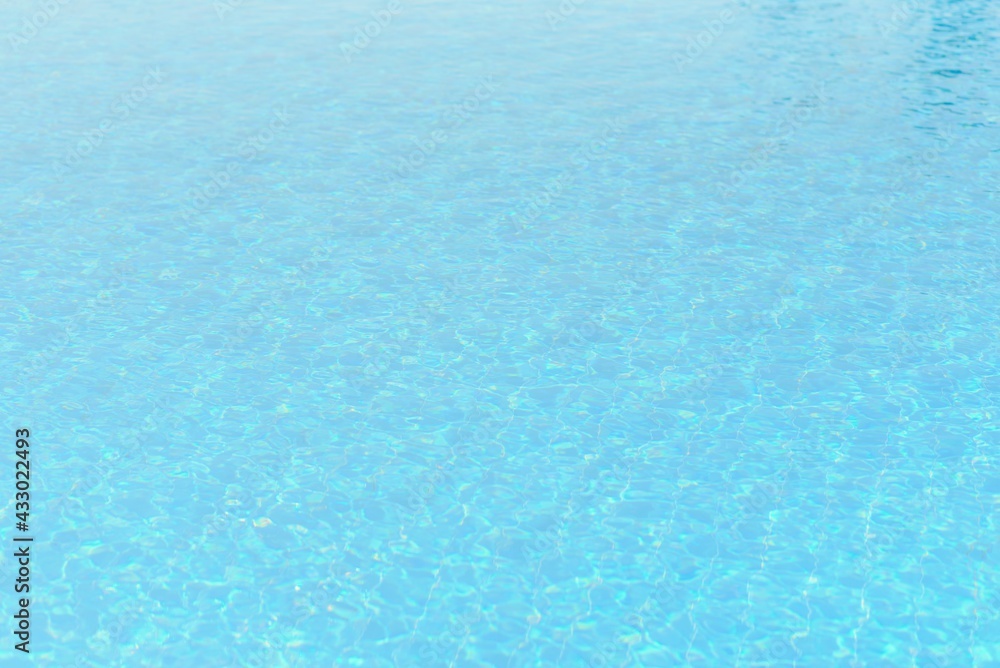 Hotel swimming pool with sunny reflections Hotel swimming pool with sunny reflections