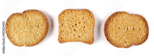 Wholemeal crackers, bread rusks pile, round and rectangle toast slices set isolated on white background, top view