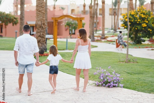 Family on vacation in a luxury hotel. Holidays at sea. © Serhii