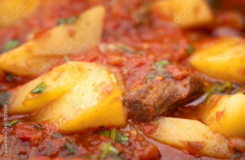 Meat dish with tomatoes and potatoes