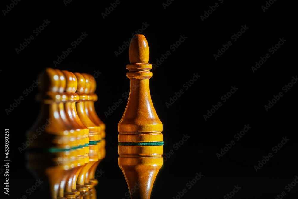 Chess pieces on a dark background. Guidance, team management, concept. Copy space. Chess pieces on a dark background. Guidance, team management, concept. Copy space.
