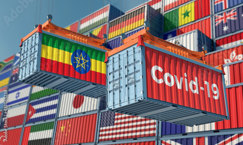 Container with Coronavirus Covid-19 text on the side and container with Ethiopia Flag. 3D Rendering © Marius Faust