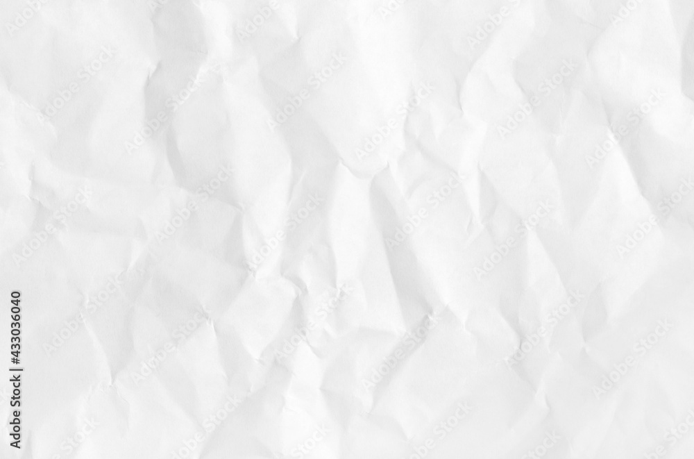 Fototapeta premium White crumpled natural paper texture for background and design art work.