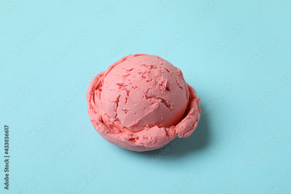 Strawberry ice cream ball on blue background Strawberry ice cream ball on blue background