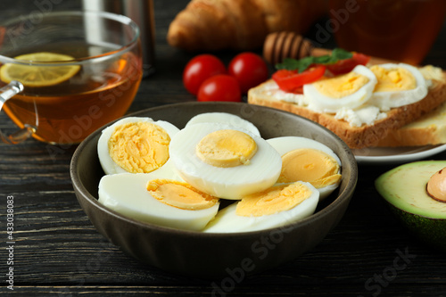 Concept of tasty breakfast with boiled eggs, close up
