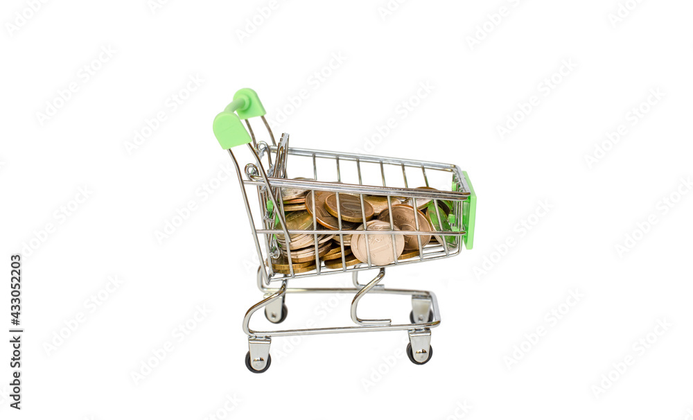 coins in a grocery cart on a white background